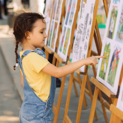 little girl at art in the park on st simons island