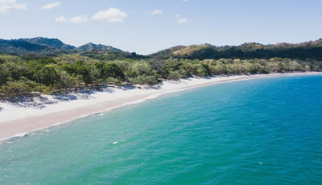 Aerial view of the clear blue waters at Playa Conchal in Costa Rica