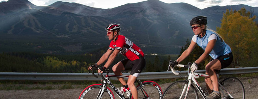 Friends enjoying the spectacular summer weather at Breckenridge while riding their bikes on the trail.