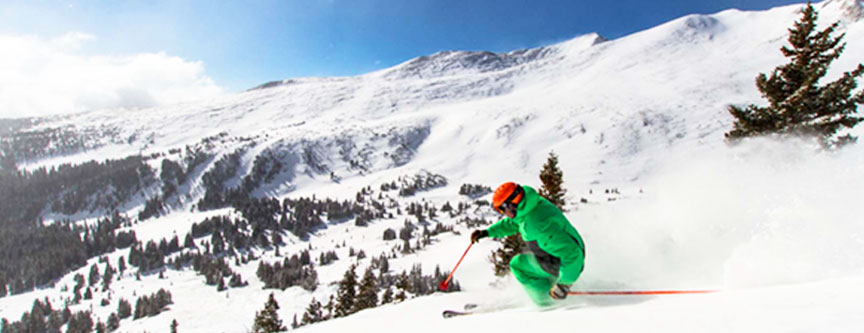 A skier begins his descent down the chutes at Breckenridge Ski Resort. World-class skiing at its best!