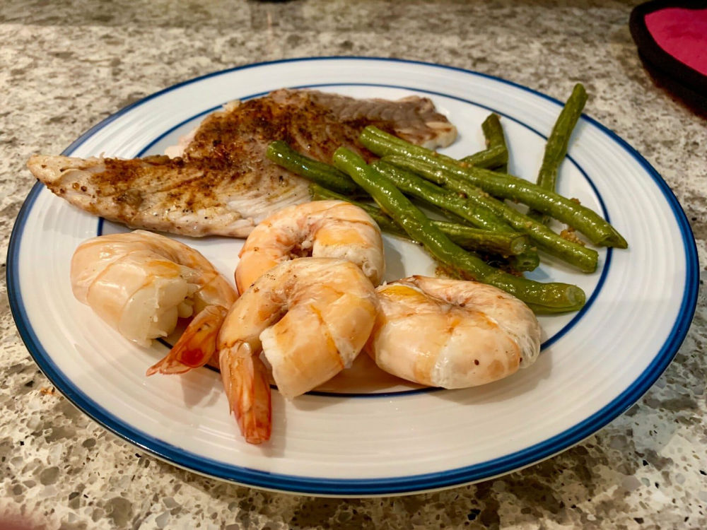 image of seafood on a plate in Cayman Island