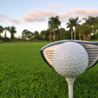 golf club up against a golf ball on a Destin golf course