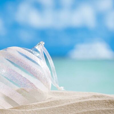 beautiful Christmas ornament on sand at the beach