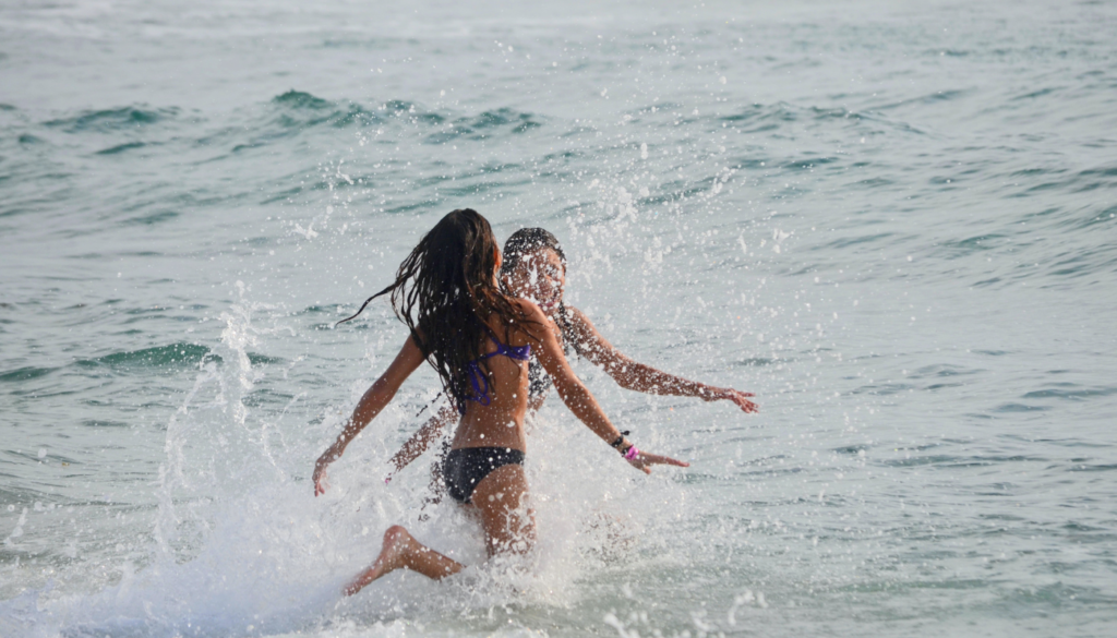 two girls playing in the Gulf of Mexico