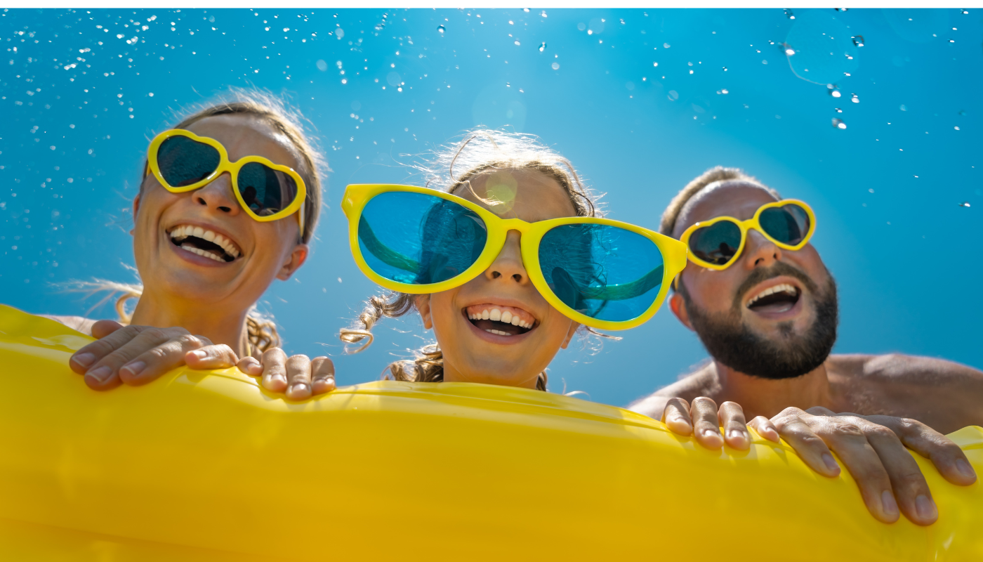 family in northwest florida on a raft in a pool during spring break