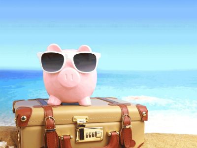 piggy bank on a suitcase