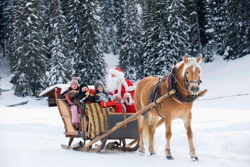 Horse-drawn sleigh rides with Santa Claus