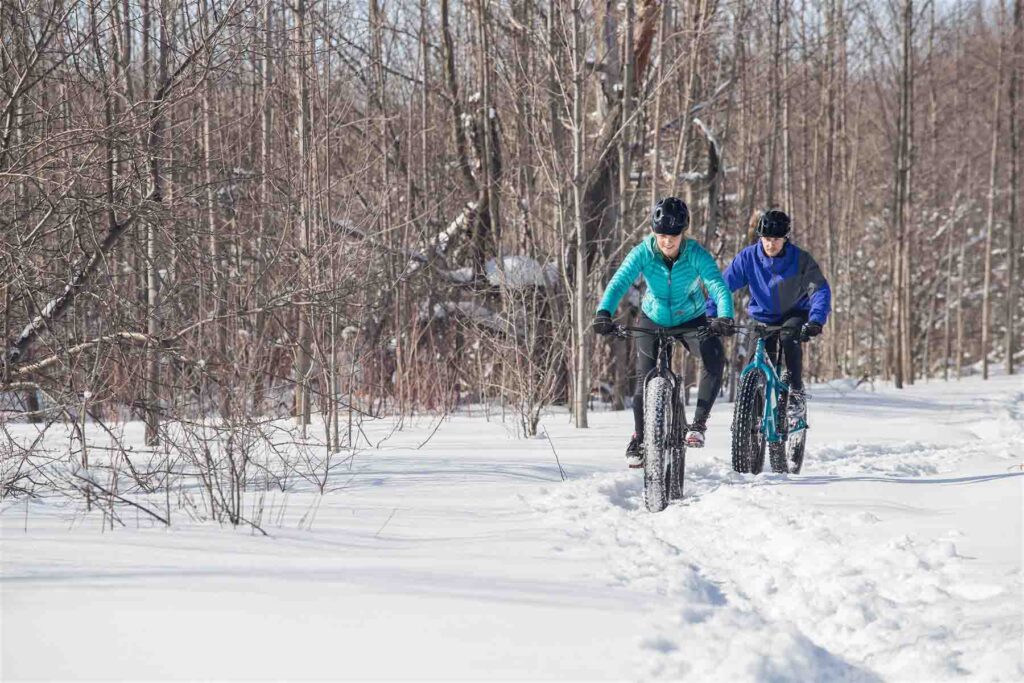 Couple fat tire biking in Bend on Phil's Trail