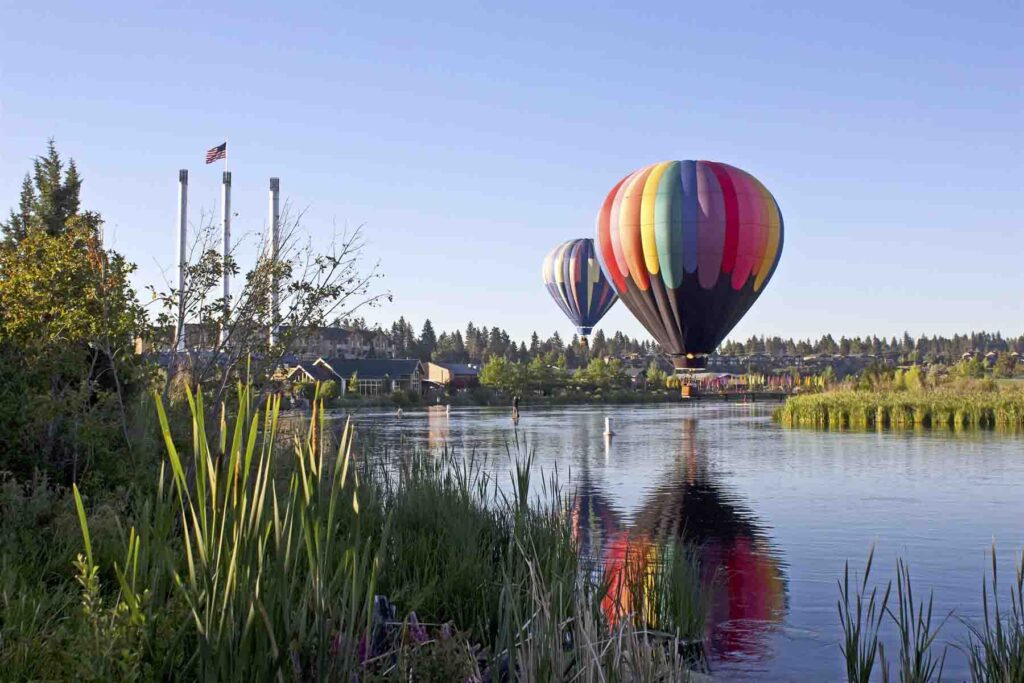 Hot Air Balloons over the river near Downtown Bend OR
