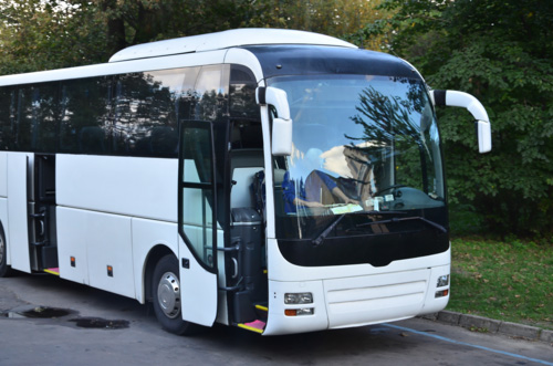 Bus Driving Down the Road