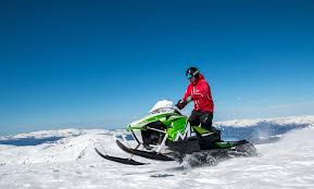 Person Snowmobiling in Bend Oregon