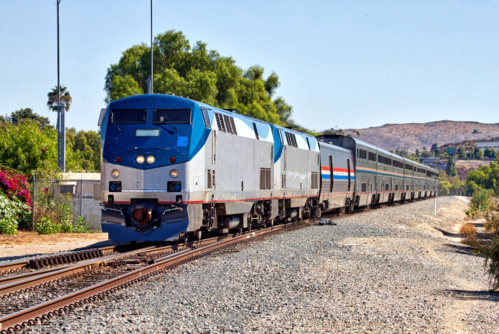 AMTRAK Train Heading Down Tracks