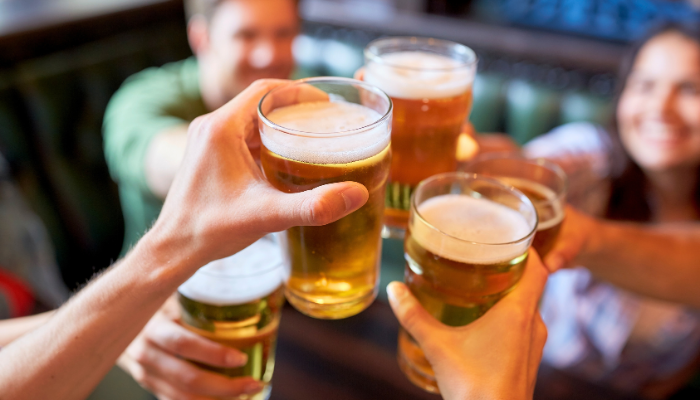 friends cheering beers