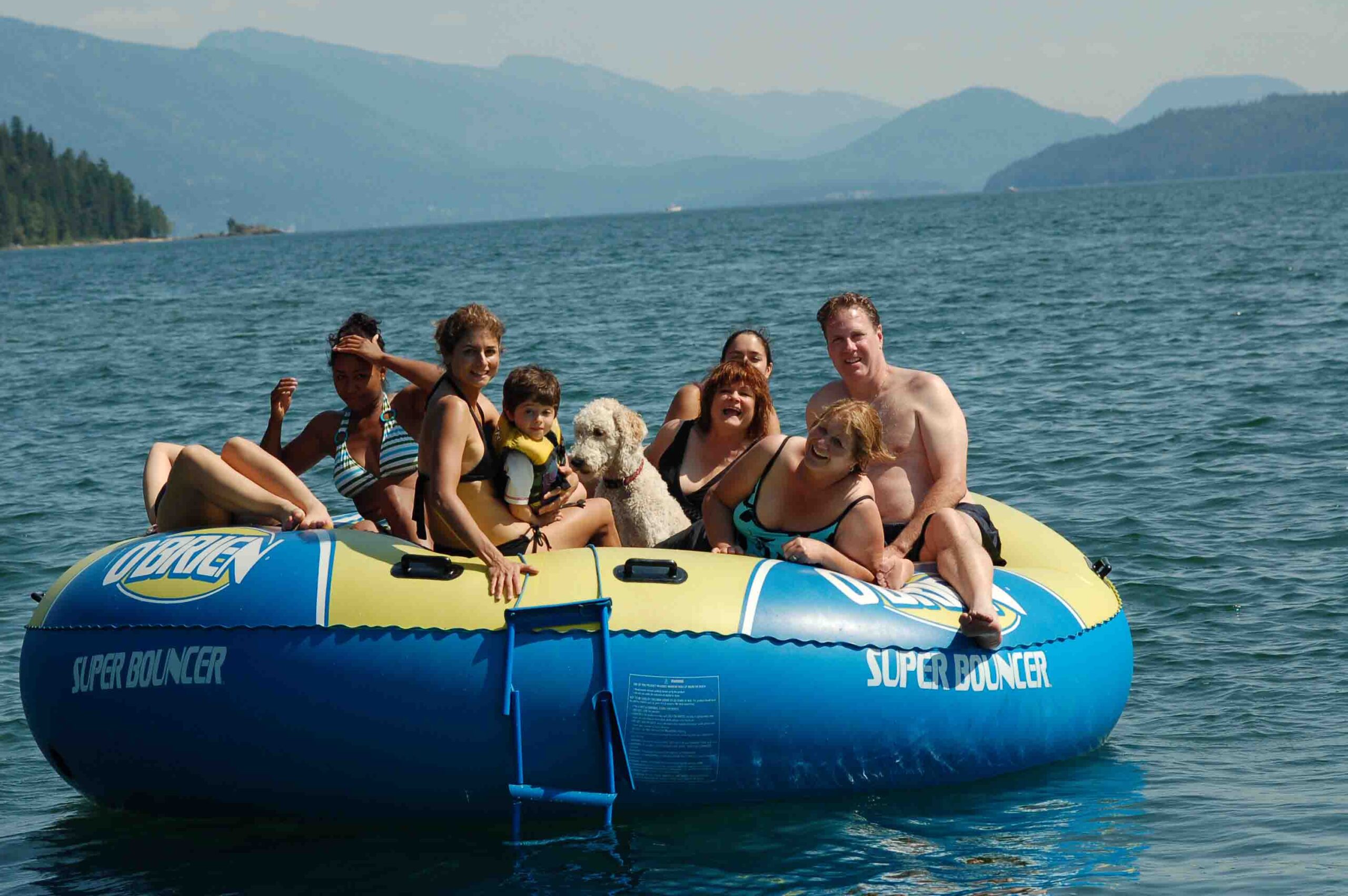 Super Bouncer on lake with family