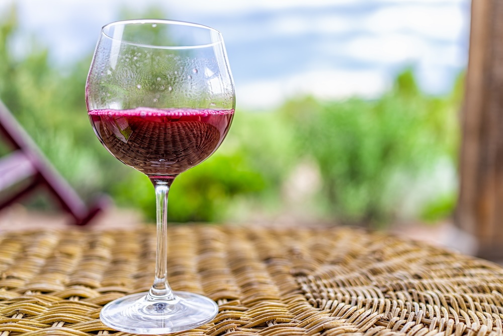 glass of wine on table at a Santa Fe restaurant