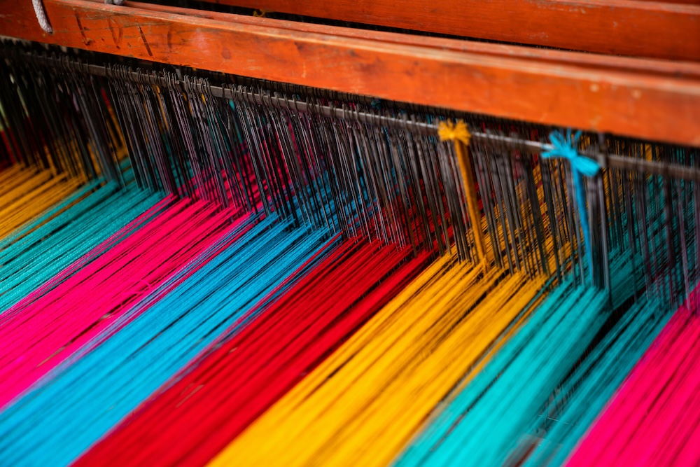 Machine used for weaving with different threads