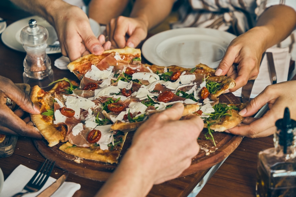 thin crust pizza shared with friends