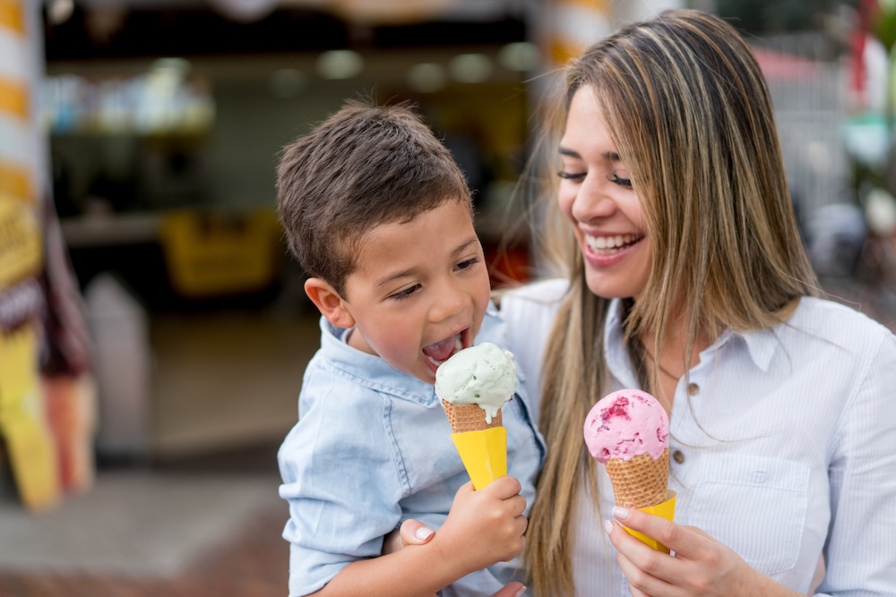 Mother and son eating ice cream cones
