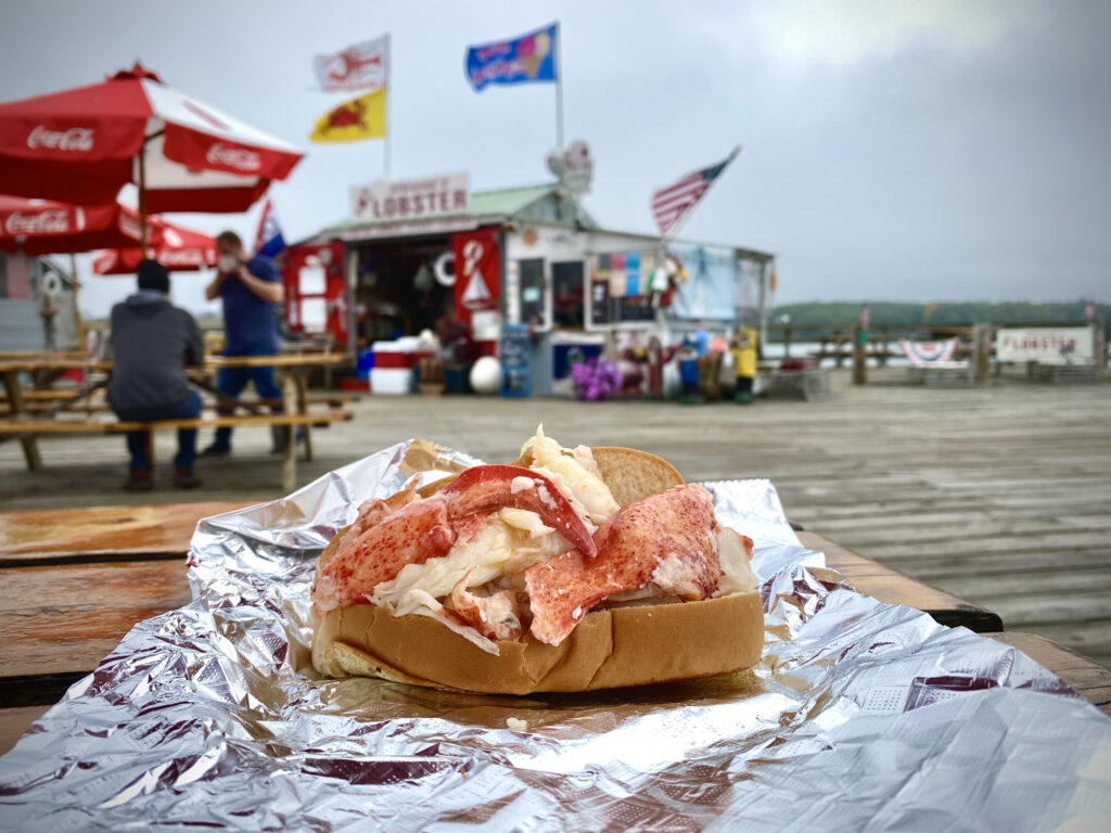maine lobster roll on waterfront dock