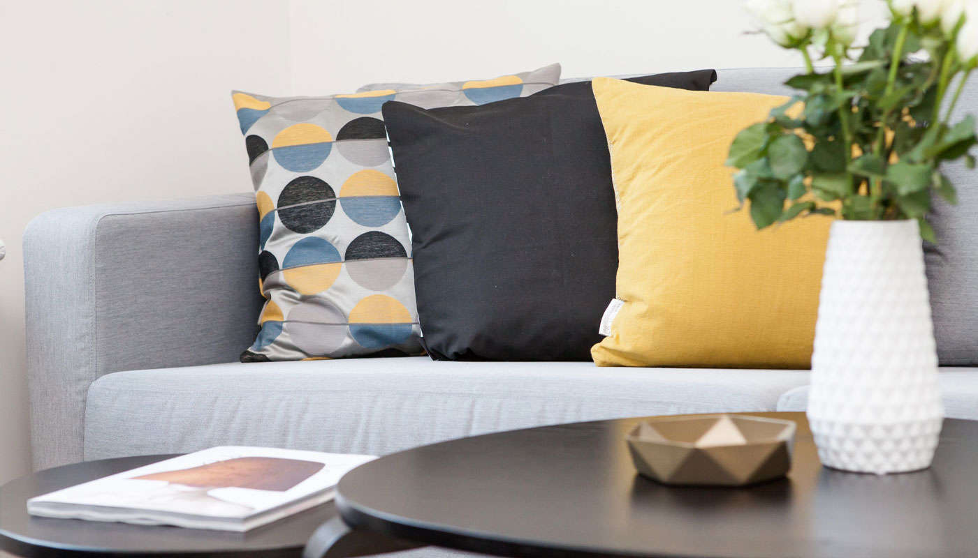 Design 101: How To Style Pillows On A Sofa Like A Pro (Plus Some