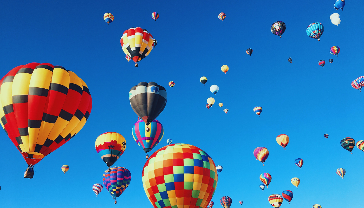 hot air balloons in the sky at the Gulf Coast Hot Air Balloon Festival