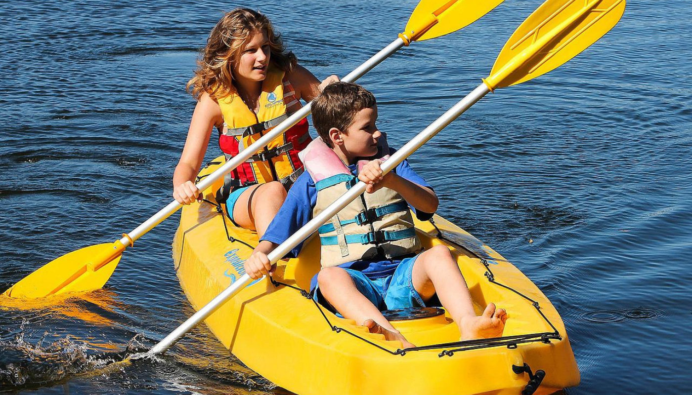 boy and girl on a paddleboard