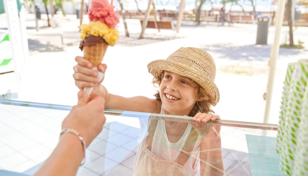 girl with ice cream during the summer in gulf shores