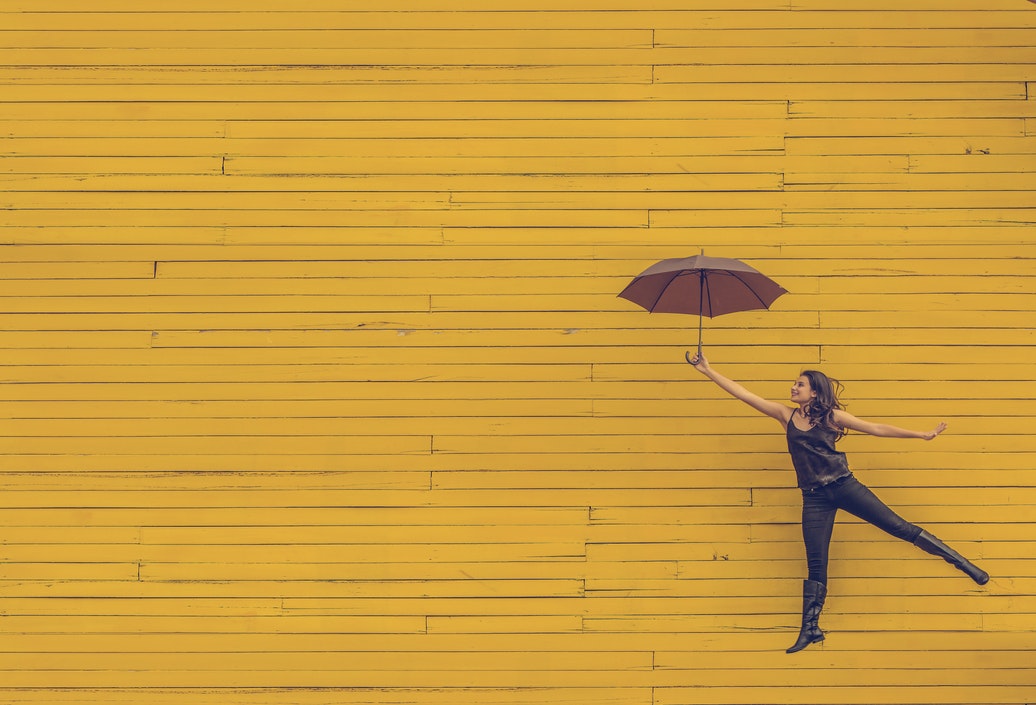 image of woman with umbrella