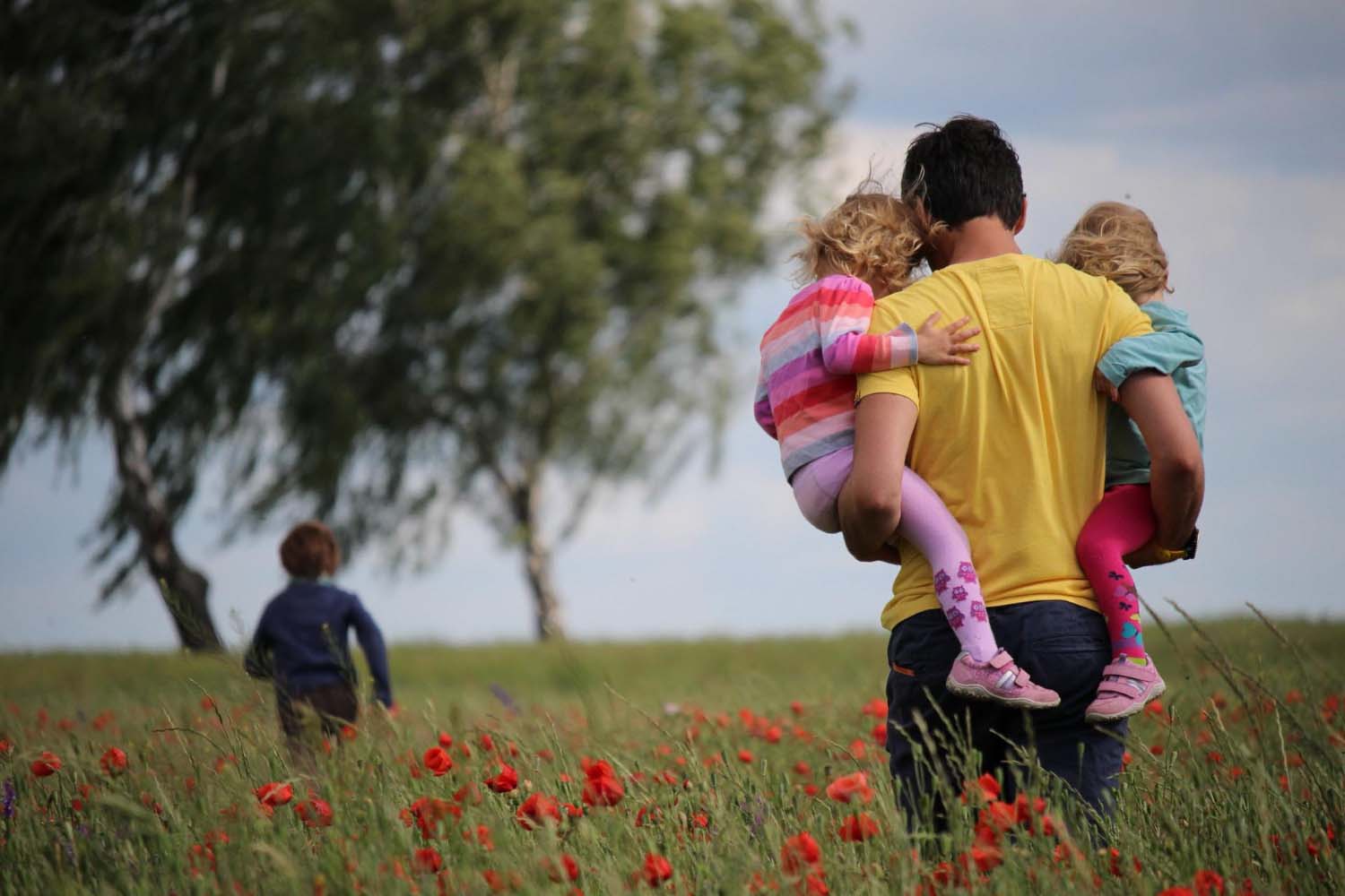 image of dad with his kids