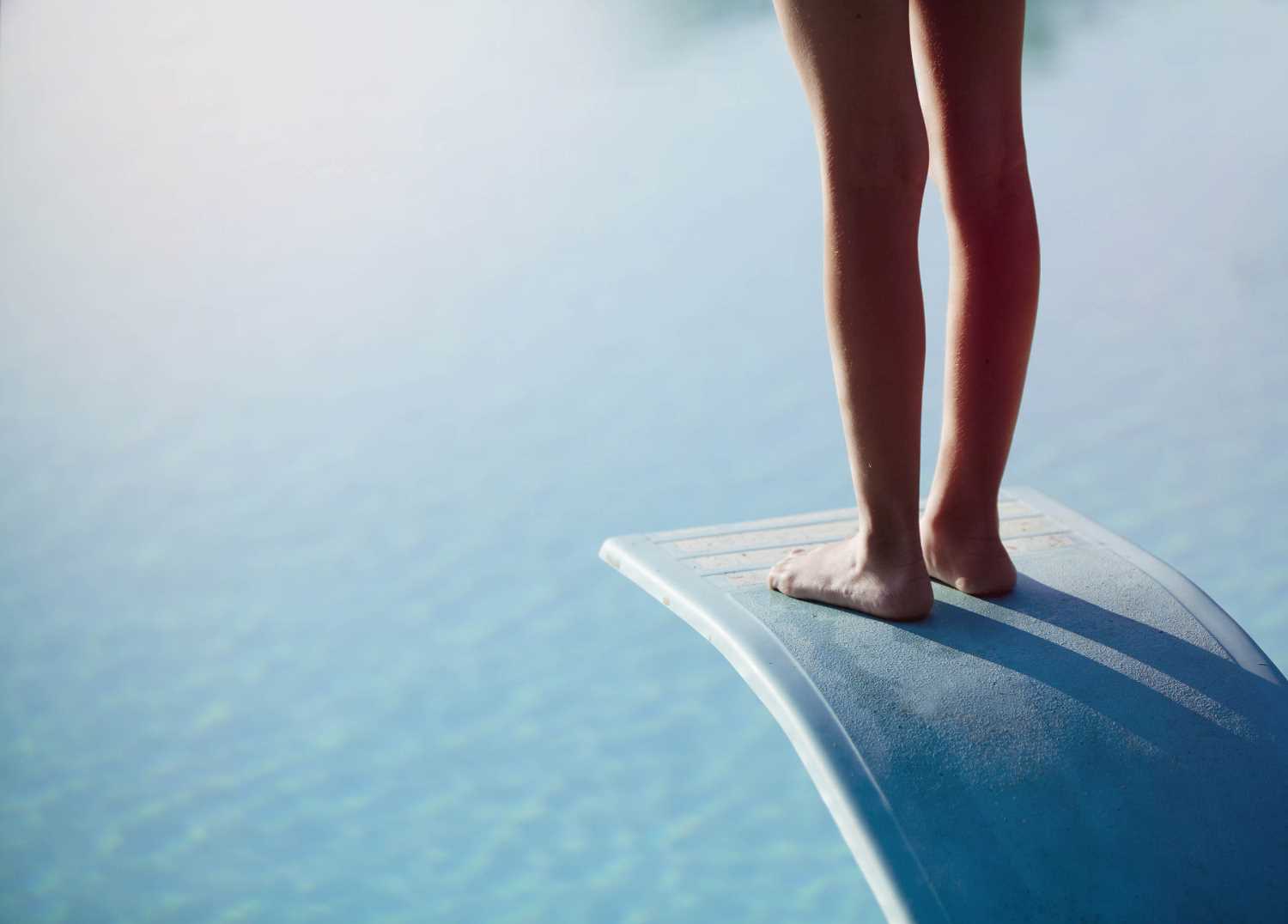 image of feet on the diving board