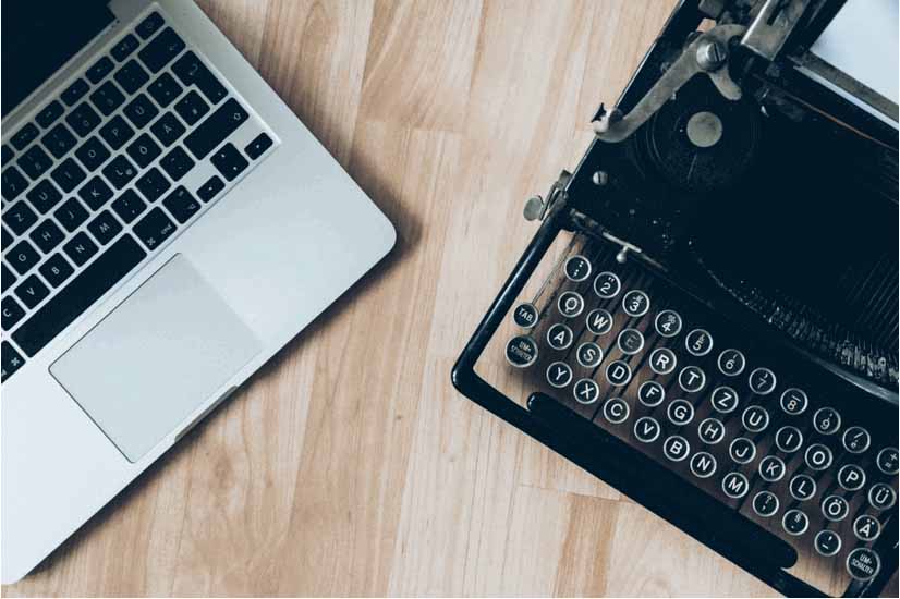 image of laptop and typewriter