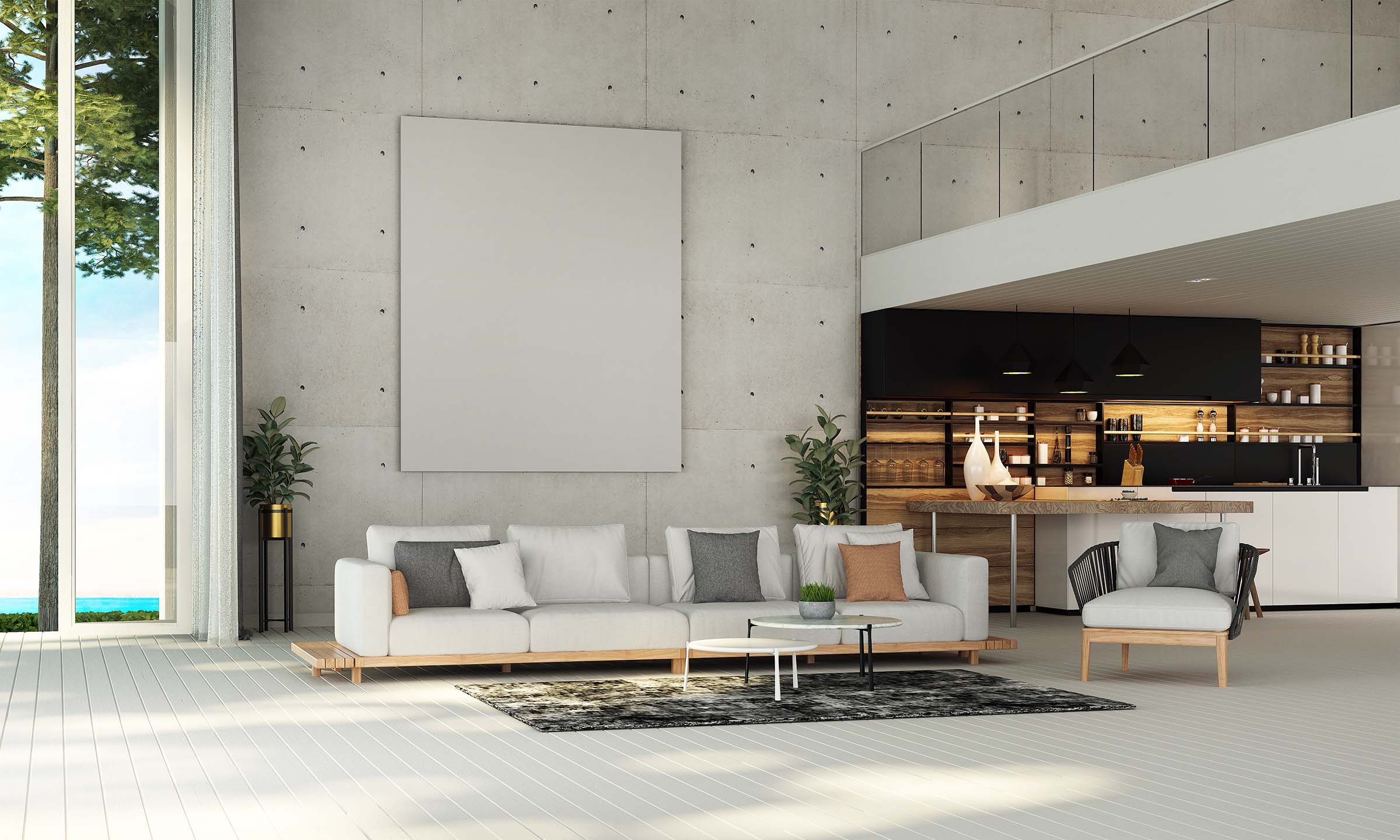 Contemporary living room in a premium corporate relocation rental property in Sydney with plush a white sofa, abstract rug, and open-plan kitchen.