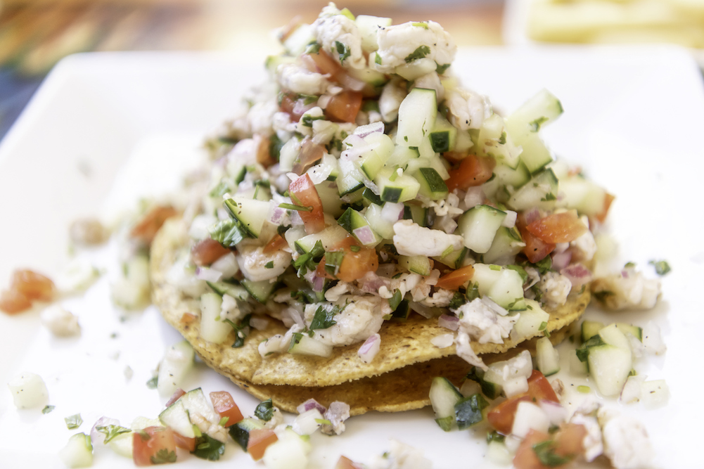 shrimp ceviche on a tostada at a Mexican restaurant. 
