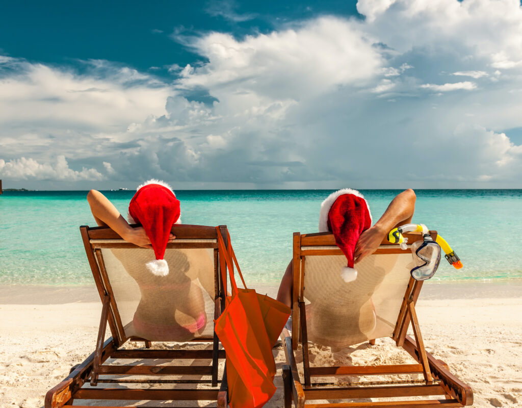 Couple enjoying on the Beach at Christmas in Maui 