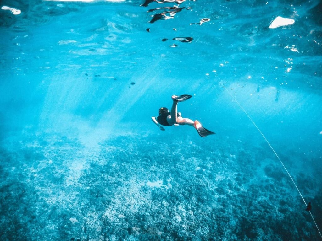 Woman exploring in one of the snorkeling spots maui