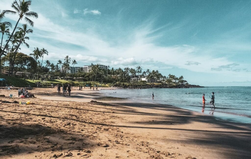 Wailea Beach with small crowds walking around which is usual for Maui in February