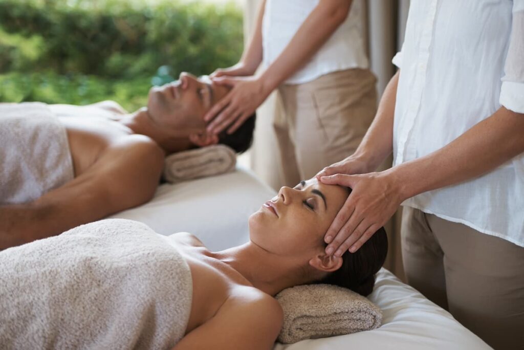 Couple getting a head massage on their romantic Maui trip