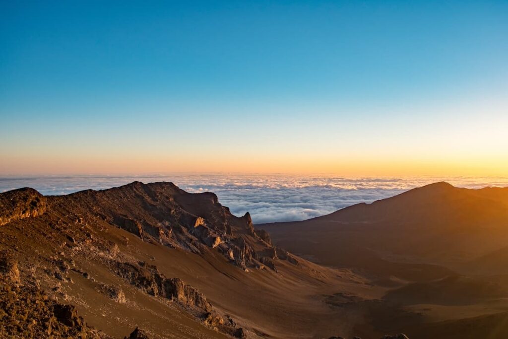 Sun rising over the clouds at Haleakalā National Park