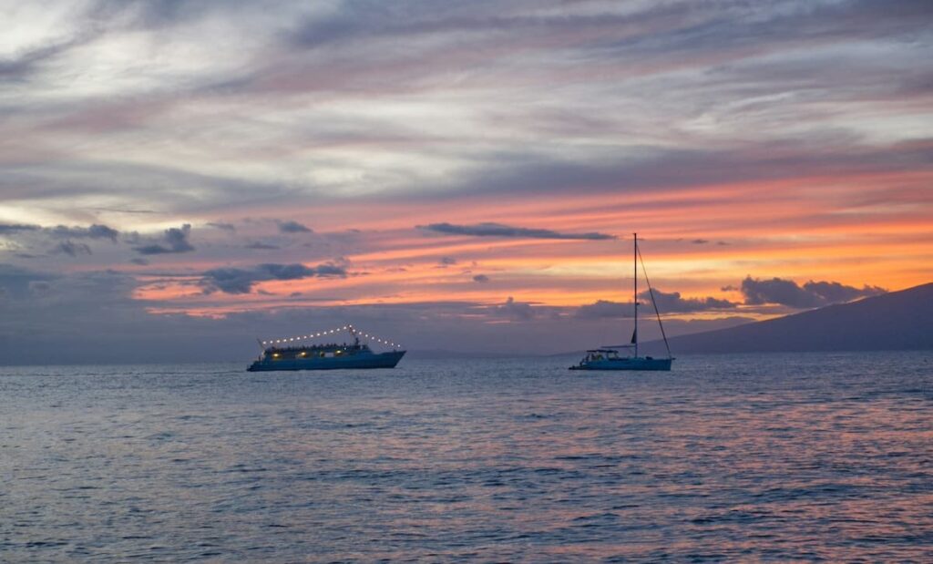 Going on a romantic sunset dinner cruise is a must-do on your Maui honeymoon itinerary