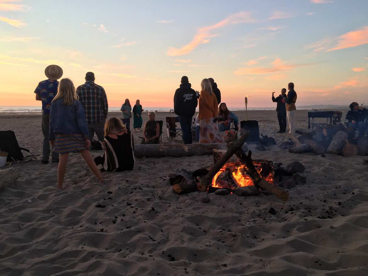 sunset beach view with people around