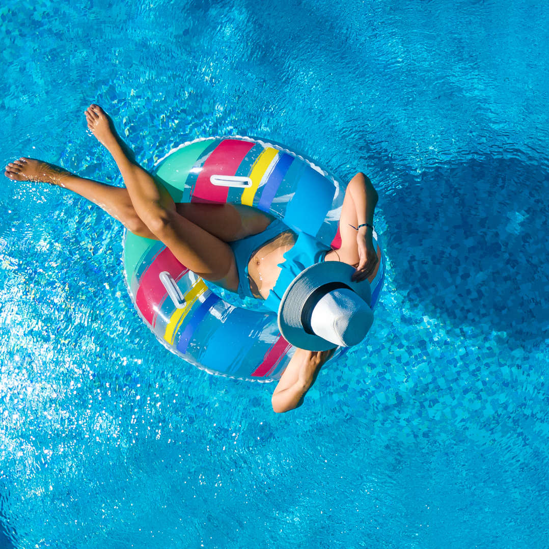 image of women lying on inflatable