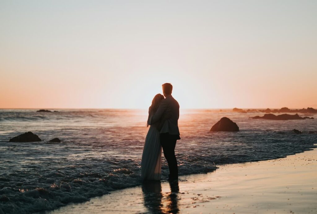 couples on sunset beach