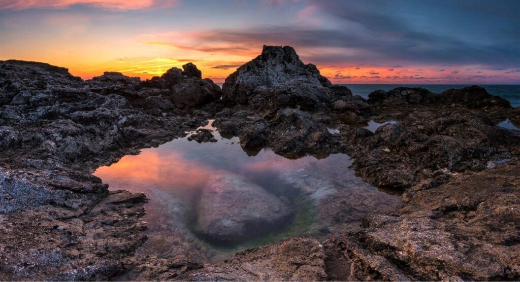 Rocky tide pools along the Oregon Coast near Cannon Beach at sunset