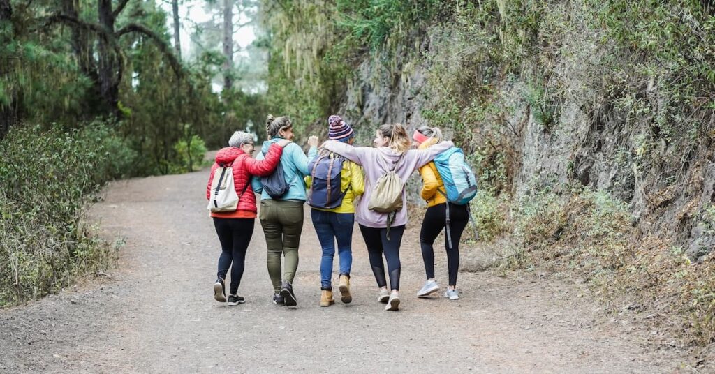 Group of women hiking while in Pacific City for the weekend