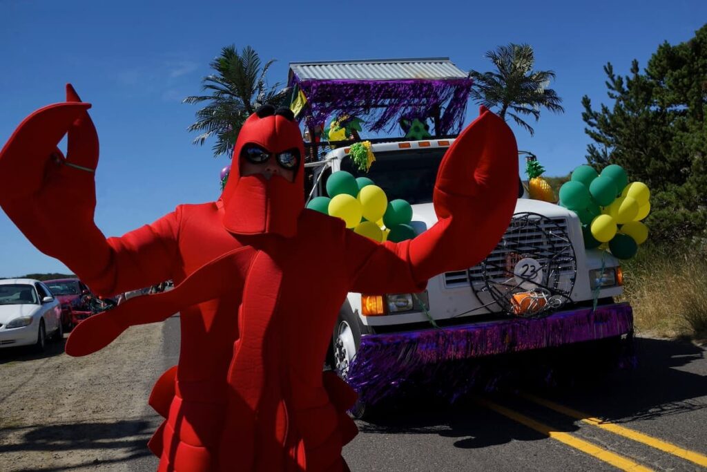 Man dressed up in a red lobster costume at the annual Dory Days festival in Pacific City