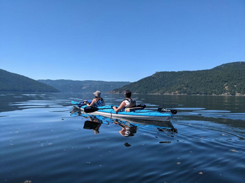 tandem kayaking in Brentwood Bay, Vancouver Island, BC