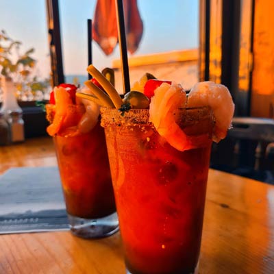 Drinks, by the ocean on an island