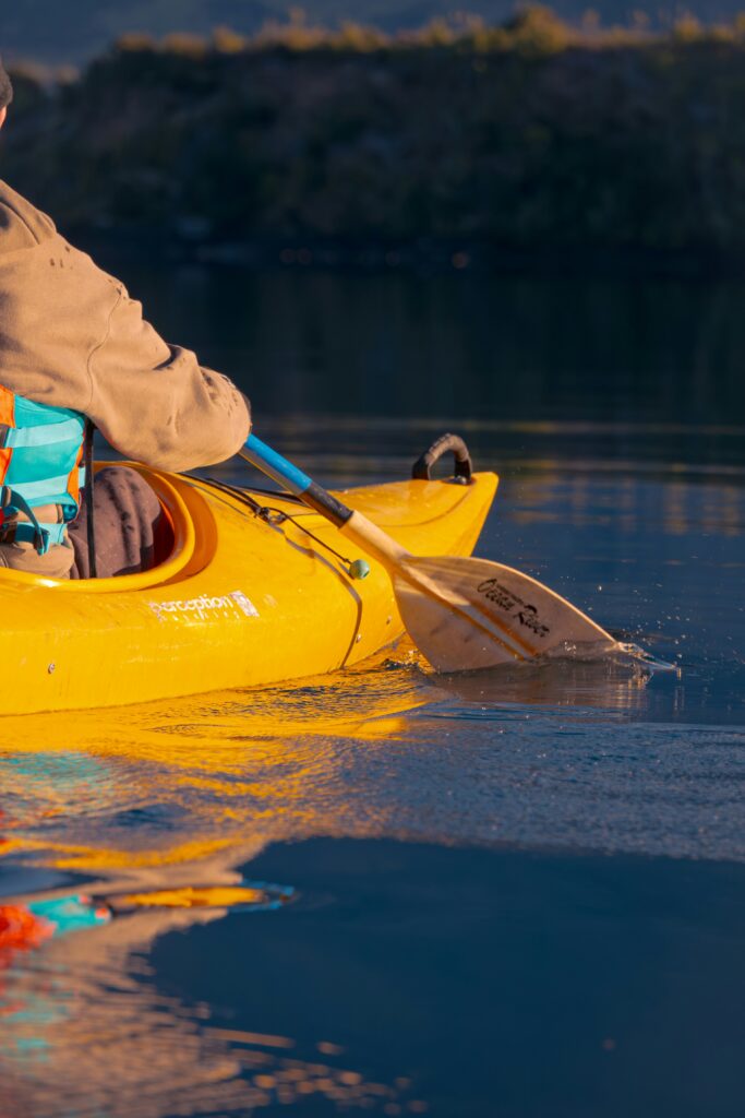 person paddling in a kayak