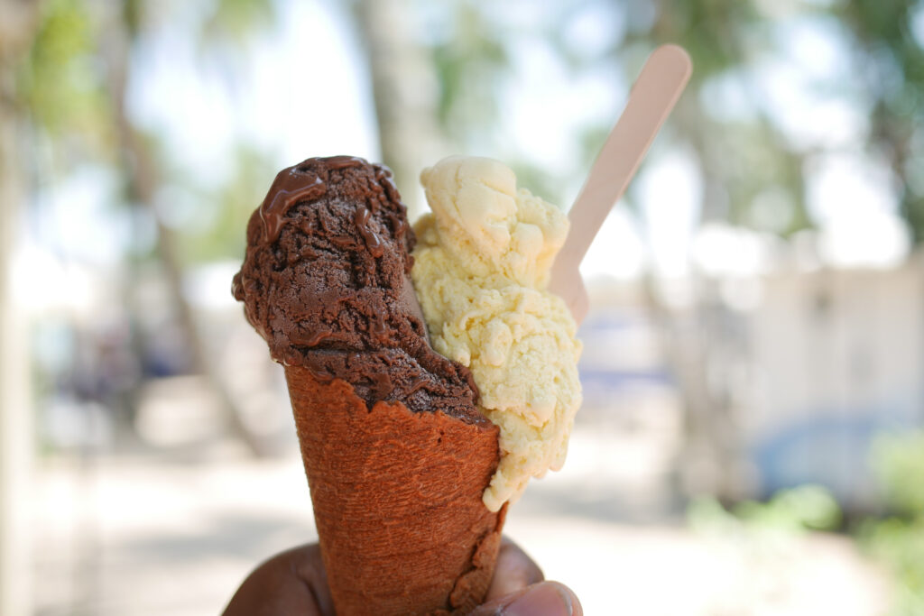 waffle cone with 
scoops of chocolate and vanilla gelato